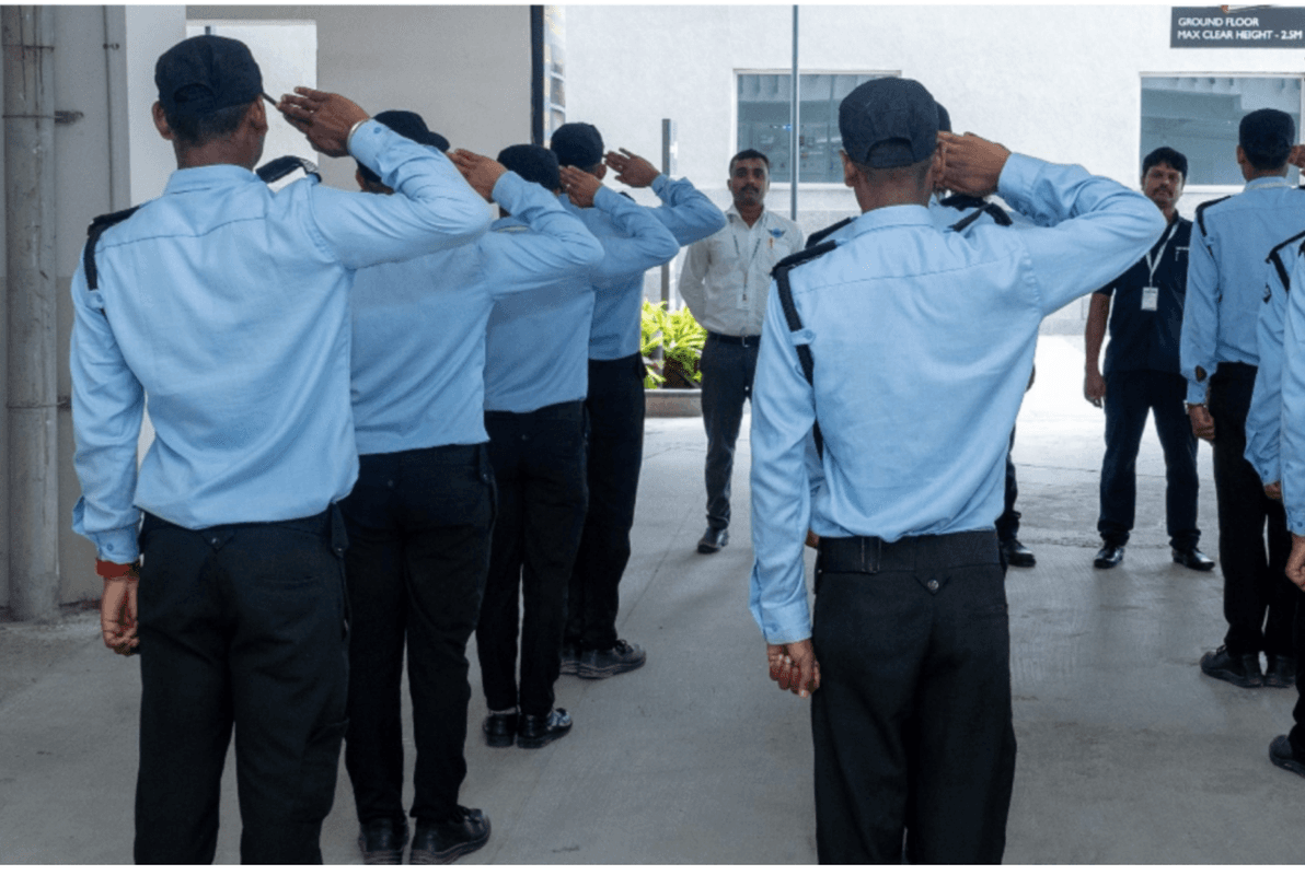 Security guards patrolling a modern facility.